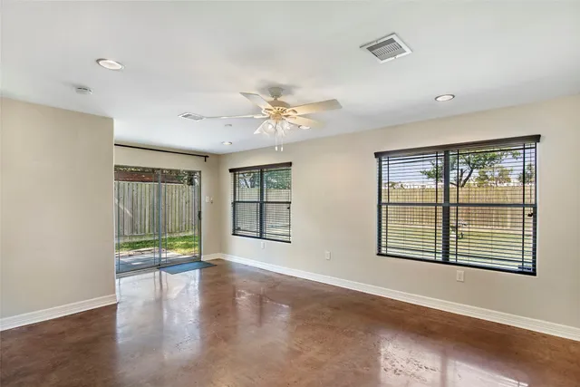 a kitchen with a sink and a stove top oven
