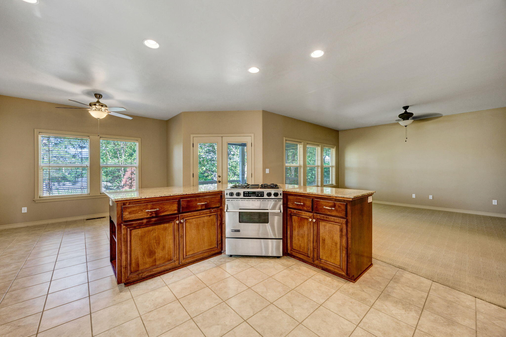 523 Ridgeway Avenue Central Point, OR 97502 - Photo 24 of 68 a kitchen with stainless steel appliances granite countertop a stove and a sink