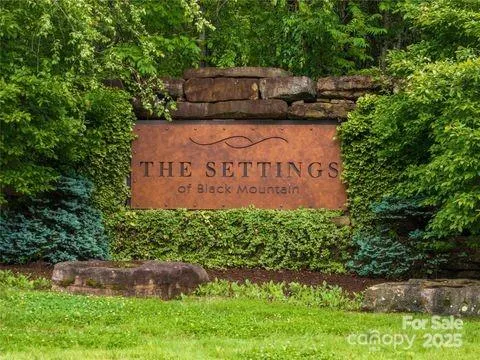 a sign on the side of the road