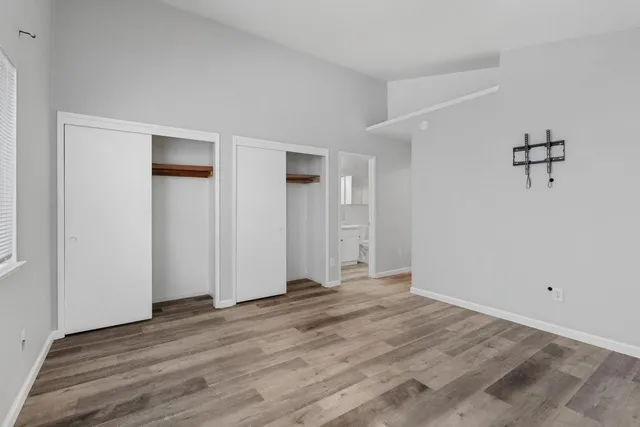 a view of room with hardwood floor