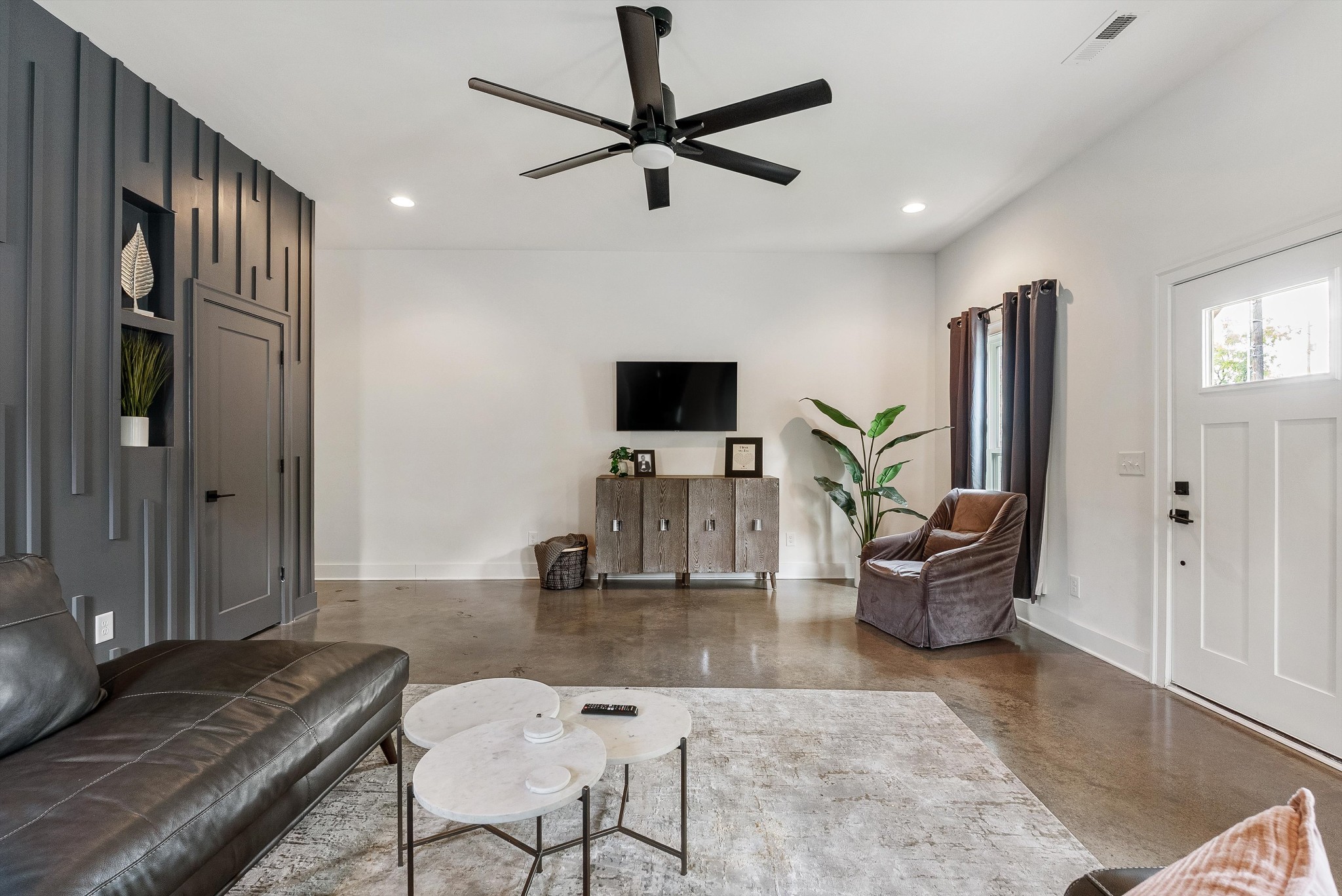906 North Maple Street Murfreesboro, TN 37130 - Photo 20 of 39 a living room with furniture and a flat screen tv
