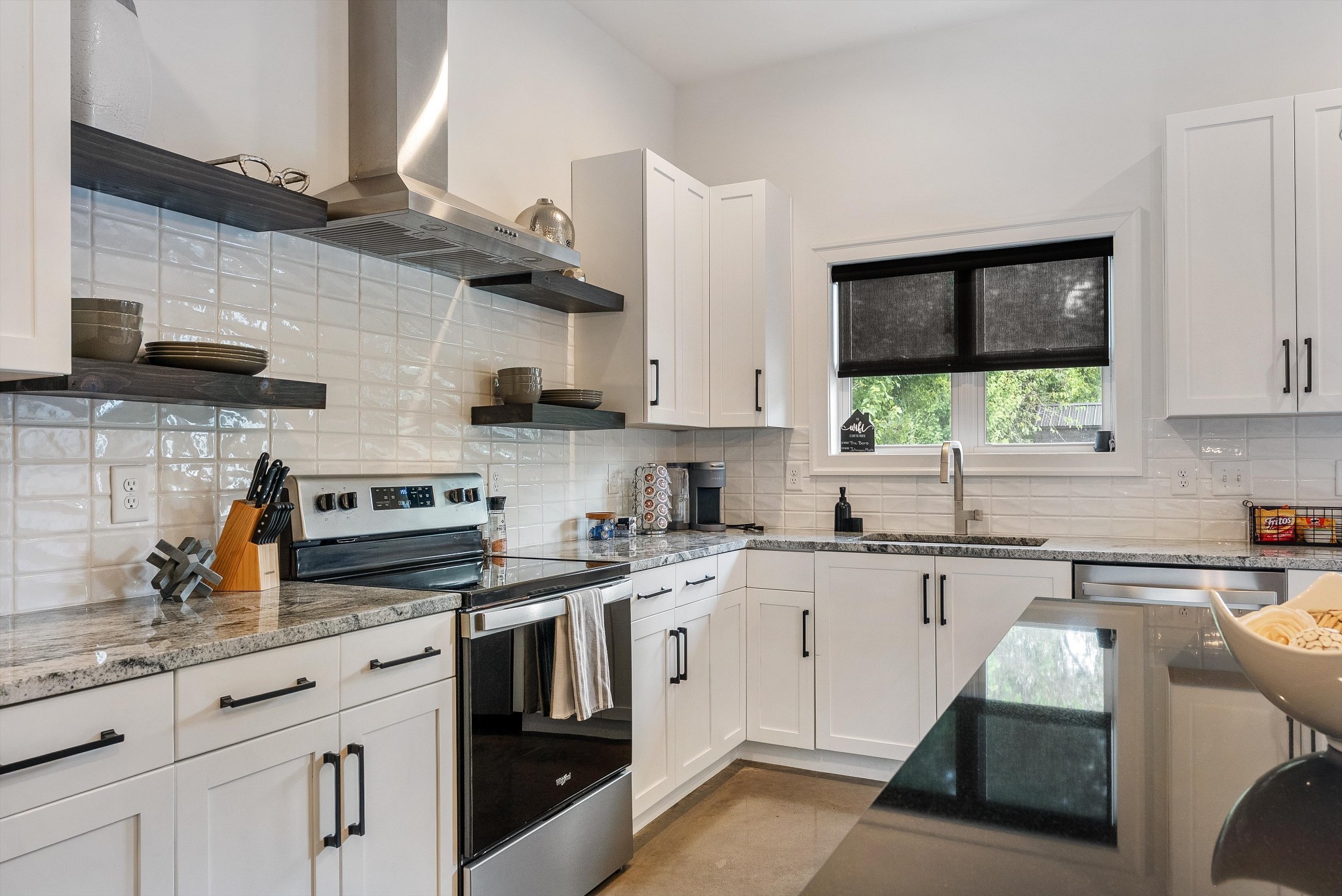 906 North Maple Street Murfreesboro, TN 37130 - Photo 23 of 39 a kitchen with stainless steel appliances granite countertop a sink a stove and cabinets