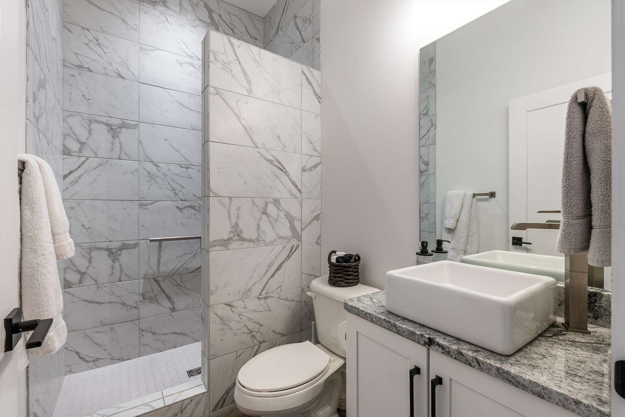 906 North Maple Street Murfreesboro, TN 37130 - Photo 26 of 39 a bathroom with a sink toilet and shower