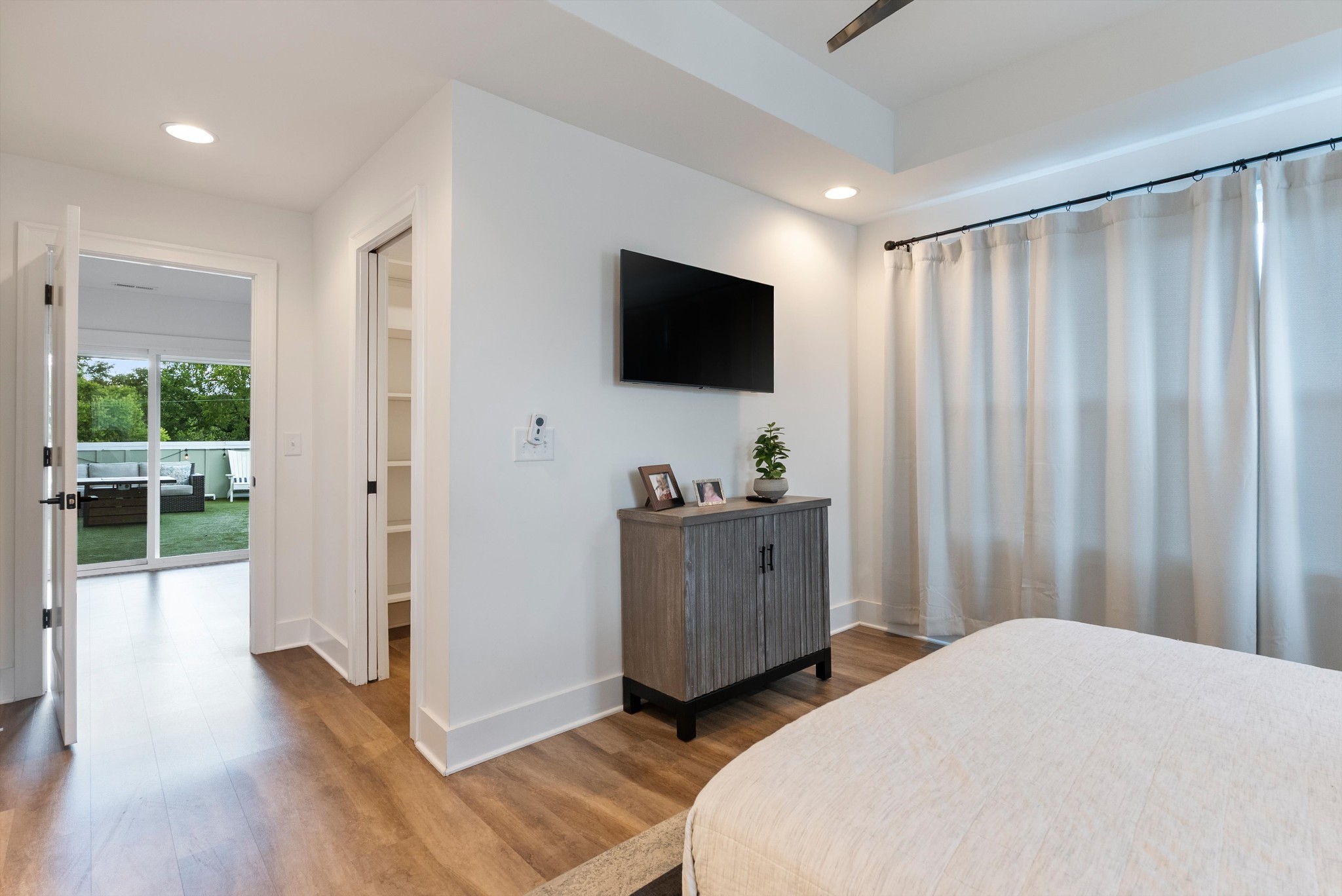 906 North Maple Street Murfreesboro, TN 37130 - Photo 36 of 39 a bedroom with furniture and a flat screen tv