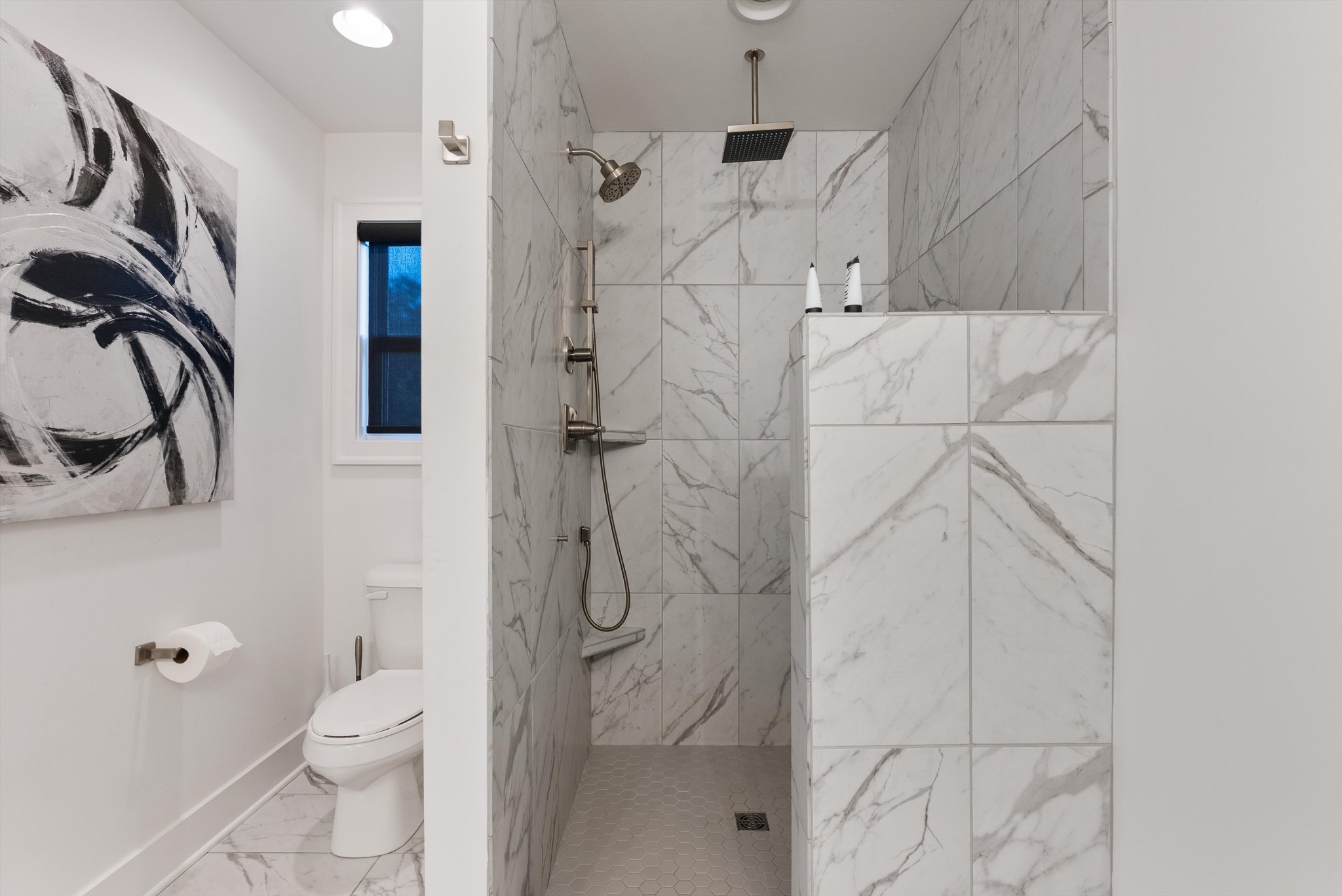 906 North Maple Street Murfreesboro, TN 37130 - Photo 37 of 39 a bathroom with a toilet sink and shower