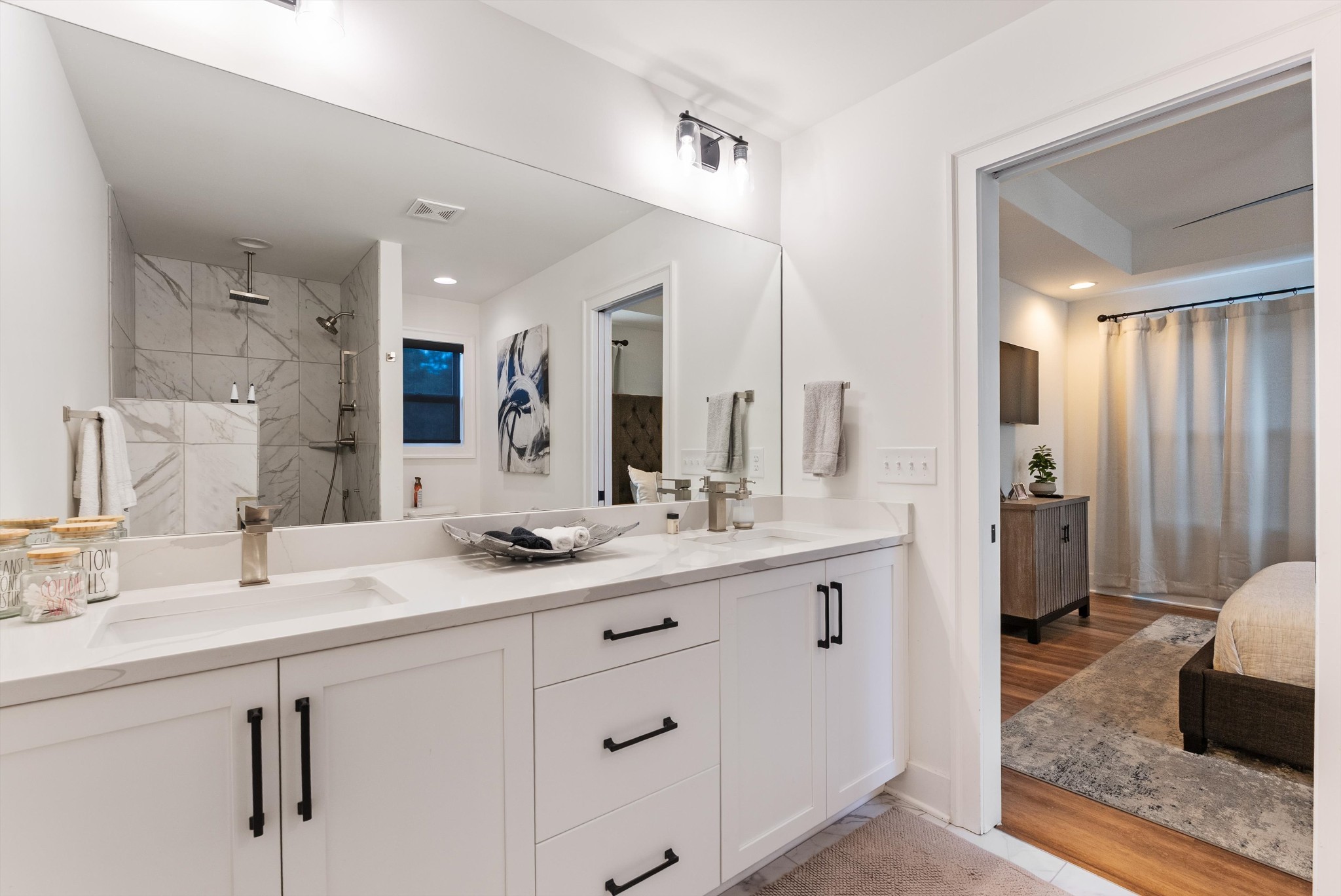 906 North Maple Street Murfreesboro, TN 37130 - Photo 38 of 39 a bathroom with a sink double vanity granite and a mirror