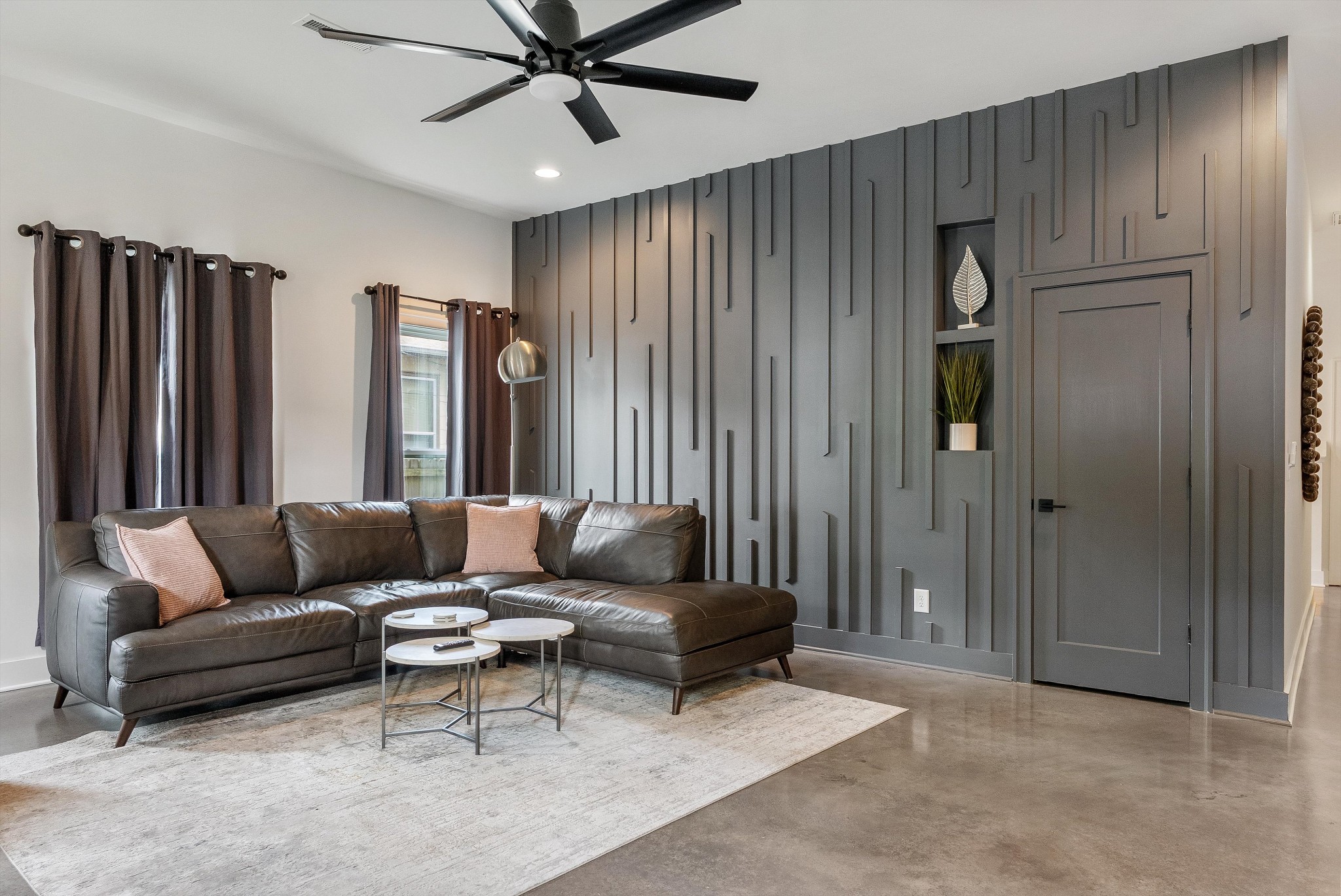 906 North Maple Street Murfreesboro, TN 37130 - Photo 5 of 39 a living room with furniture and a ceiling fan
