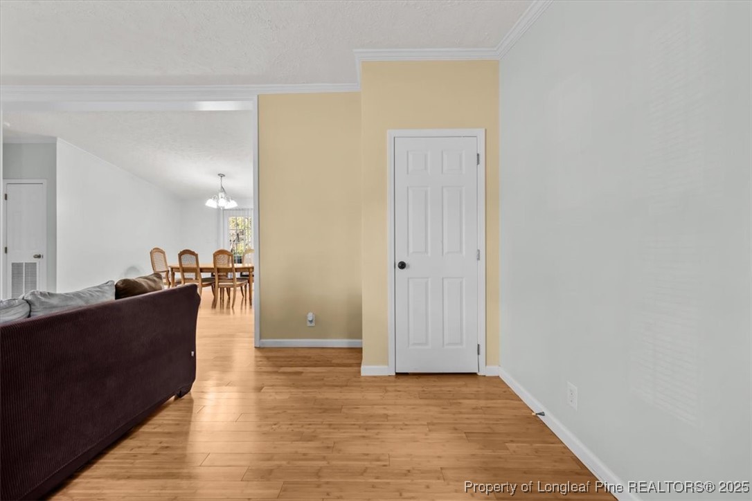 11891 Aberdeen Road Aberdeen, NC 28315 - Photo 6 of 35 a view of a living room with a wooden floor