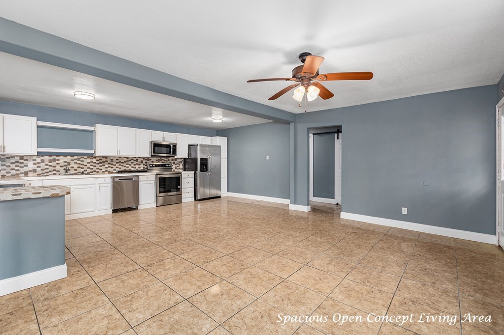 2915 Freeman Street Lufkin, TX 75901 - Photo 13 of 33 a view of a kitchen with a sink and cabinets