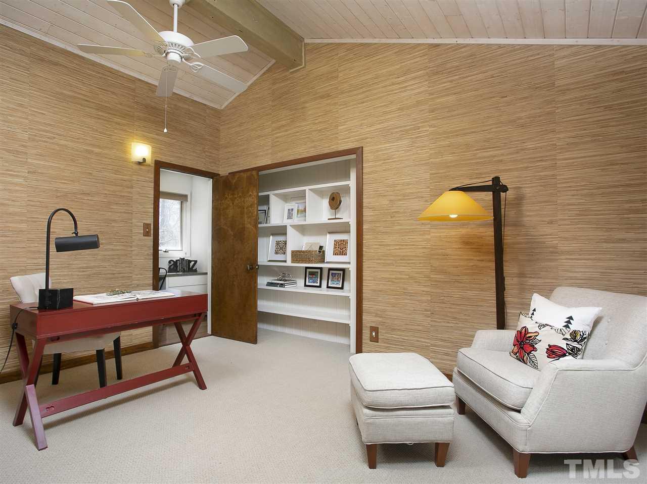 806 Kenmore Road Chapel Hill, NC 27514 - Photo 19 of 30 a living room with furniture and a table
