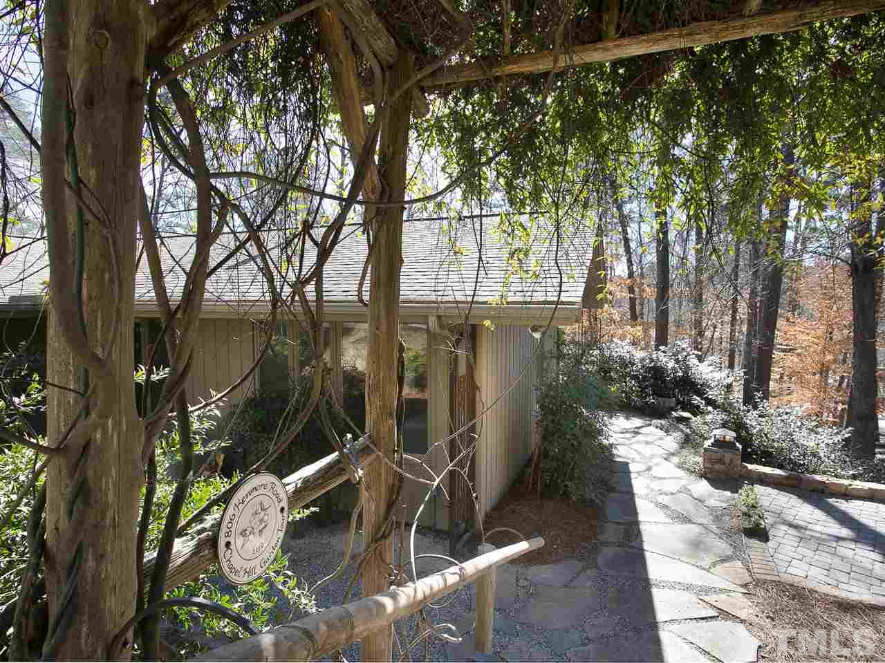 806 Kenmore Road Chapel Hill, NC 27514 - Photo 24 of 30 a view of a backyard of the house