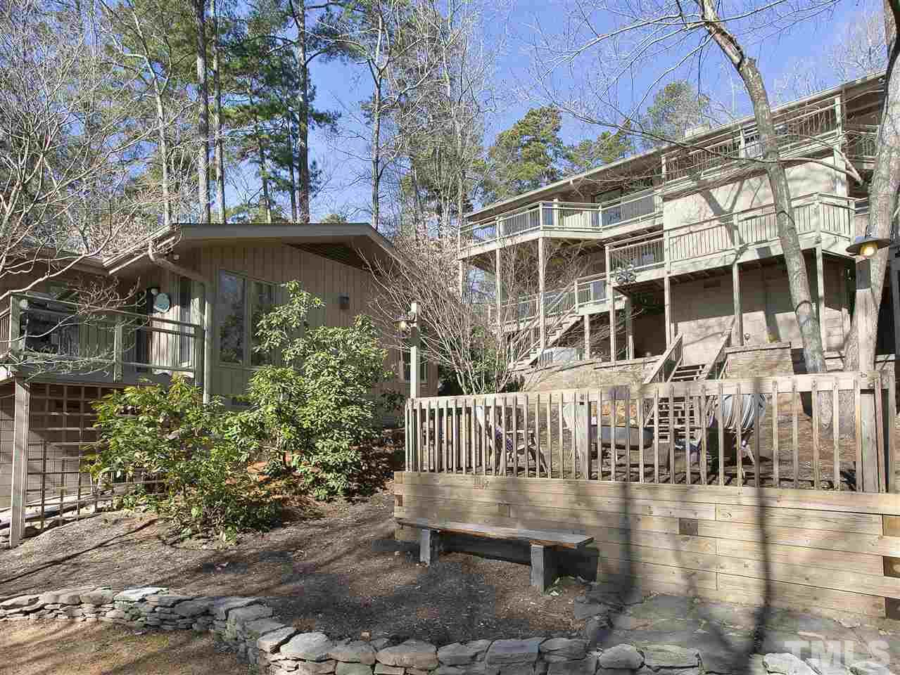 806 Kenmore Road Chapel Hill, NC 27514 - Photo 28 of 30 a view of a building with a yard