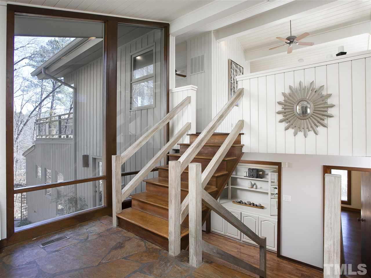 806 Kenmore Road Chapel Hill, NC 27514 - Photo 5 of 30 a view of entryway with wooden floor and stairs