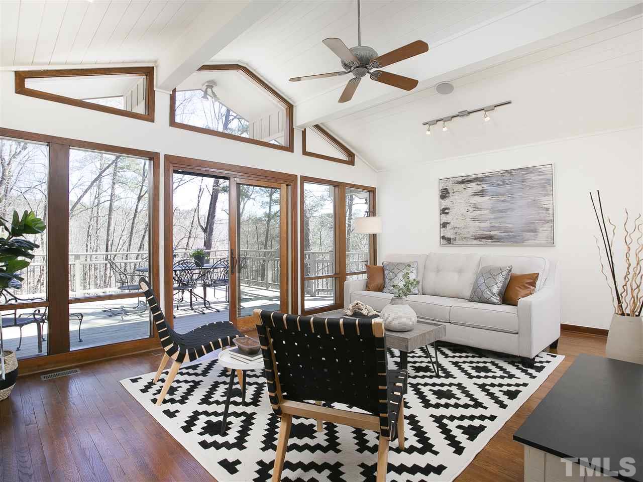 806 Kenmore Road Chapel Hill, NC 27514 - Photo 6 of 30 a living room with furniture and a large window