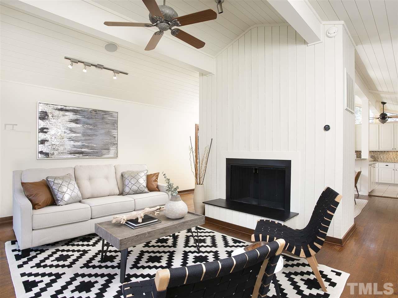 806 Kenmore Road Chapel Hill, NC 27514 - Photo 8 of 30 a living room with furniture and a fireplace