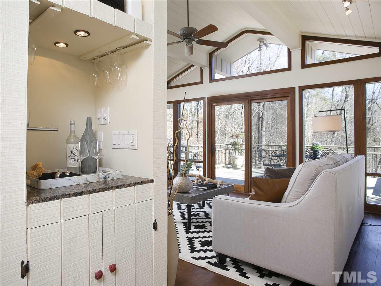 806 Kenmore Road Chapel Hill, NC 27514 - Photo 9 of 30 a living room with furniture and a large window