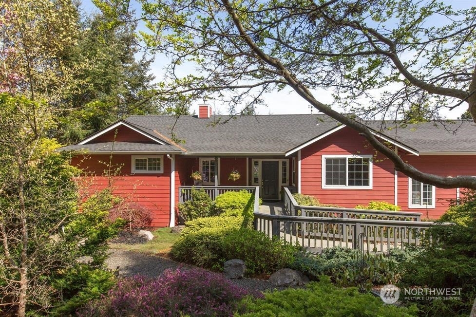50 Henkes Road Sequim, WA 98382 - Photo 1 of 40 a front view of a house with garden