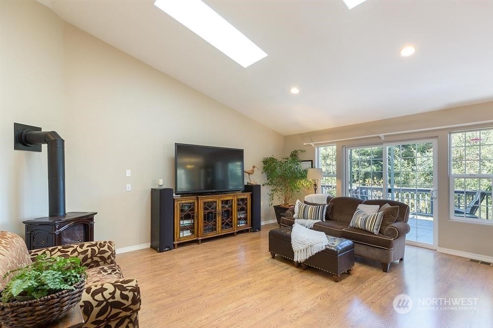 50 Henkes Road Sequim, WA 98382 - Photo 13 of 40 a living room with furniture and a flat screen tv