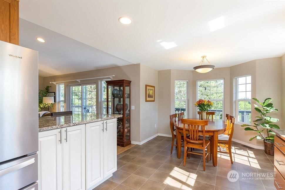 50 Henkes Road Sequim, WA 98382 - Photo 16 of 40 a view of a dining room with furniture window and outside view