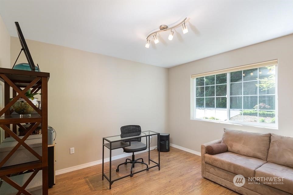 50 Henkes Road Sequim, WA 98382 - Photo 23 of 40 a living room with furniture and a window