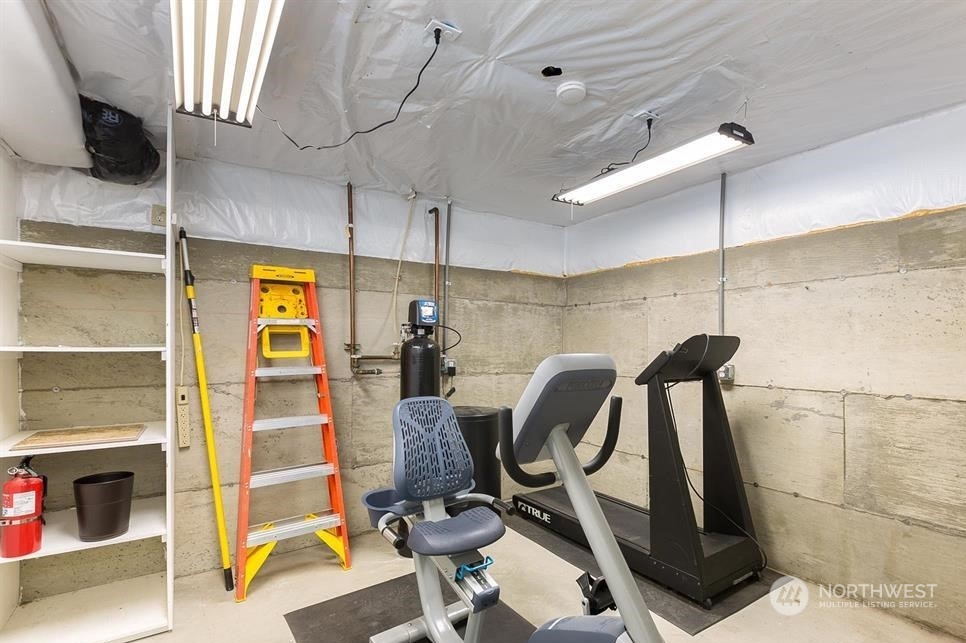 50 Henkes Road Sequim, WA 98382 - Photo 36 of 40 a view of a room with gym equipment