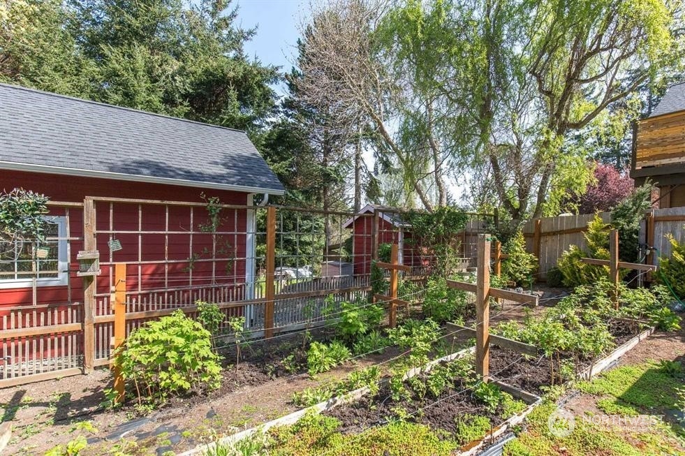 50 Henkes Road Sequim, WA 98382 - Photo 38 of 40 a front view of a house with garden