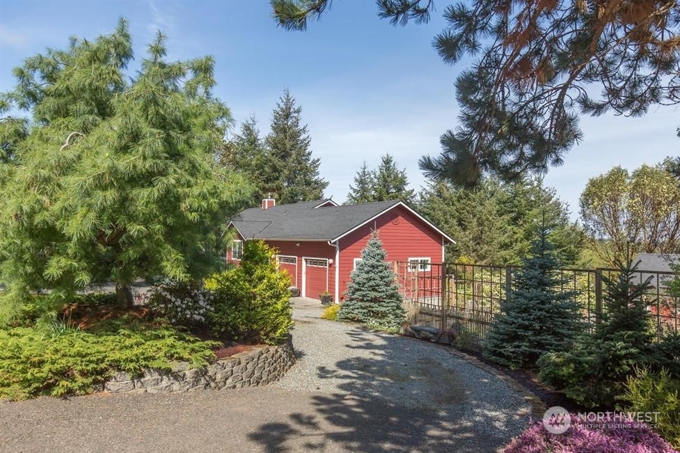 50 Henkes Road Sequim, WA 98382 - Photo 40 of 40 a view of a house with a yard