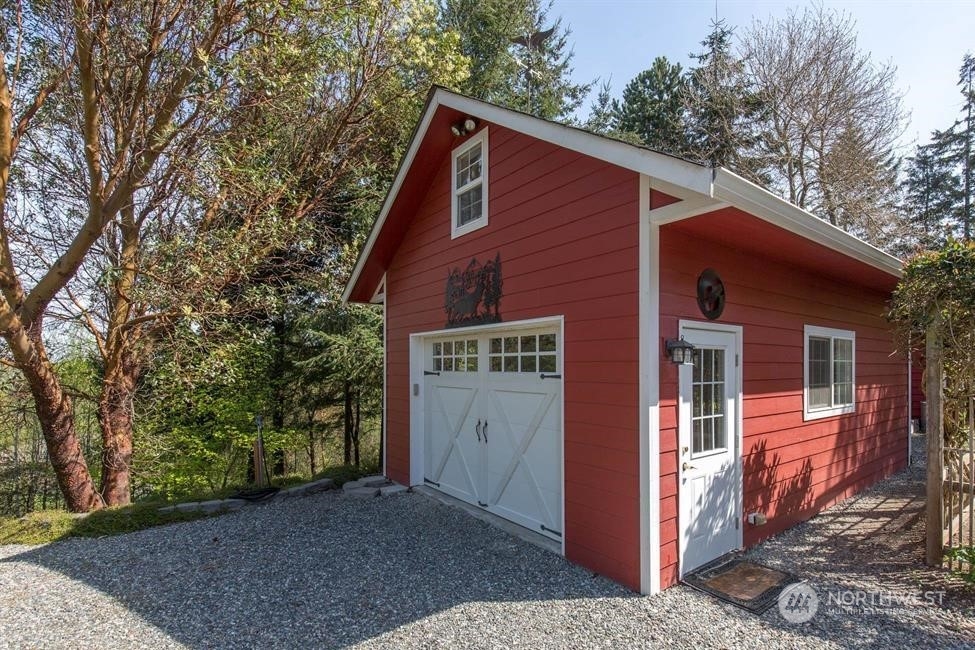 50 Henkes Road Sequim, WA 98382 - Photo 4 of 40 a view of a house with a yard
