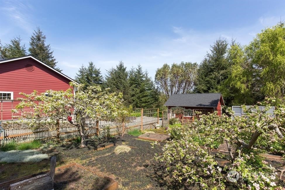 50 Henkes Road Sequim, WA 98382 - Photo 6 of 40 a view of a house with a yard