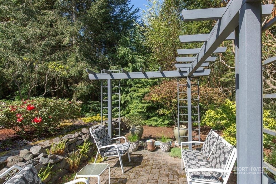 50 Henkes Road Sequim, WA 98382 - Photo 7 of 40 a view of an chairs and tables in the patio