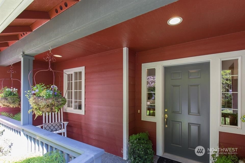 50 Henkes Road Sequim, WA 98382 - Photo 10 of 40 front view of a house with a porch