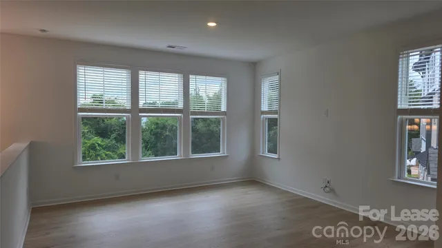 an empty room with windows