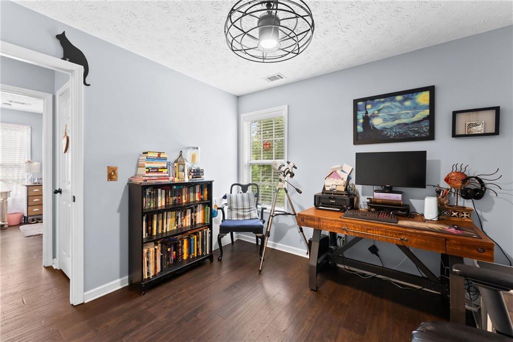 3615 South Bend Road Gainesville, GA 30506 - Photo 24 of 54 a view of a workspace with furniture and a window