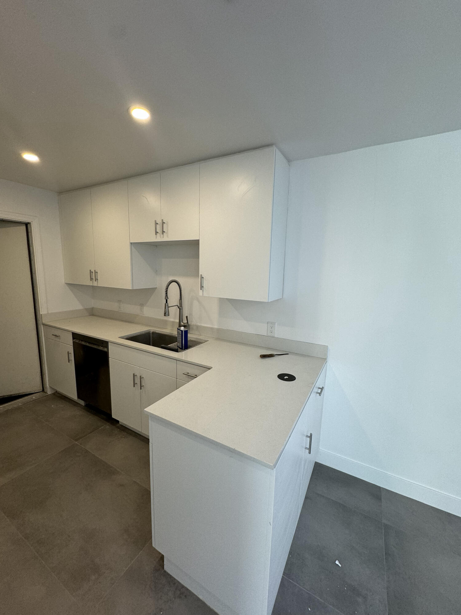 32525 Monte Vista Road Cathedral City, CA 92234 - Photo 6 of 10 a kitchen with a sink stove and cabinets