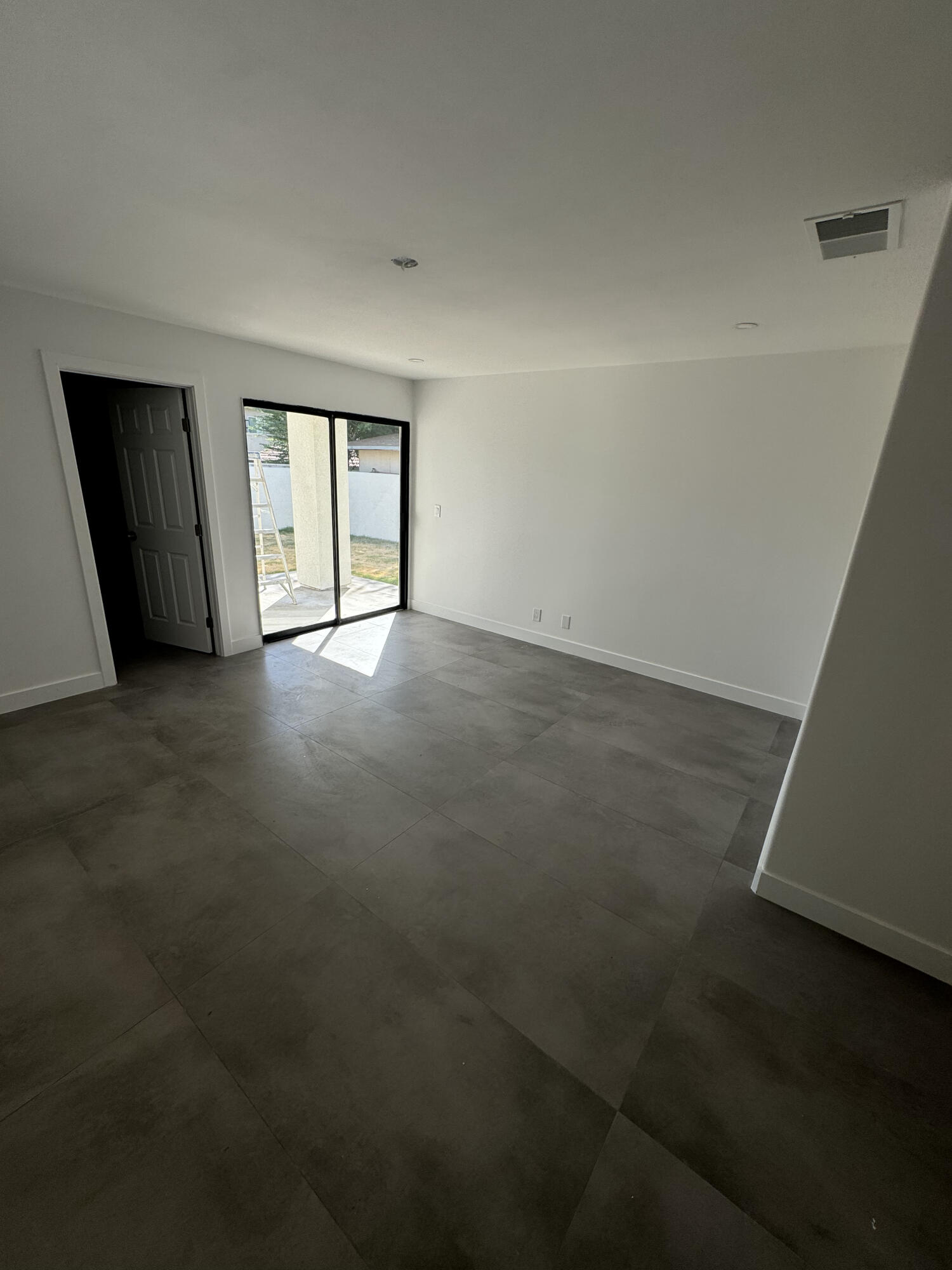 32525 Monte Vista Road Cathedral City, CA 92234 - Photo 8 of 10 an empty room with windows