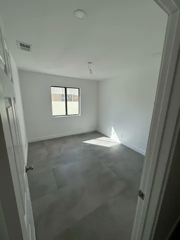 an empty room with windows