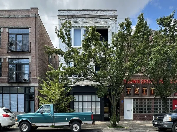 a car parked in front of a building