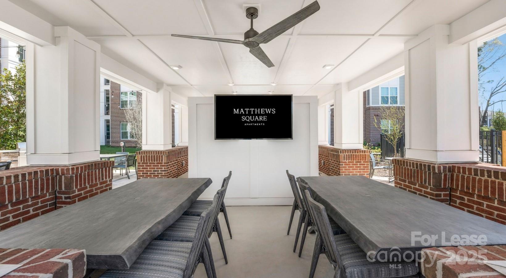 4010 Waiting Street, Unit C3 Matthews, NC 28105 - Photo 18 of 36 a view of a dining room with furniture