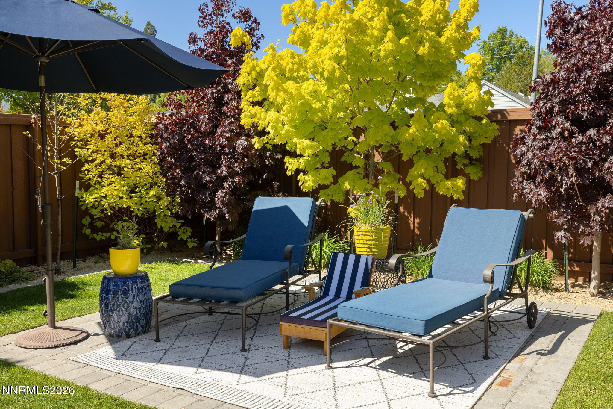 210 Bret Harte Avenue Reno, NV 89509 - Photo 33 of 40 a view of a chairs and table in the patio