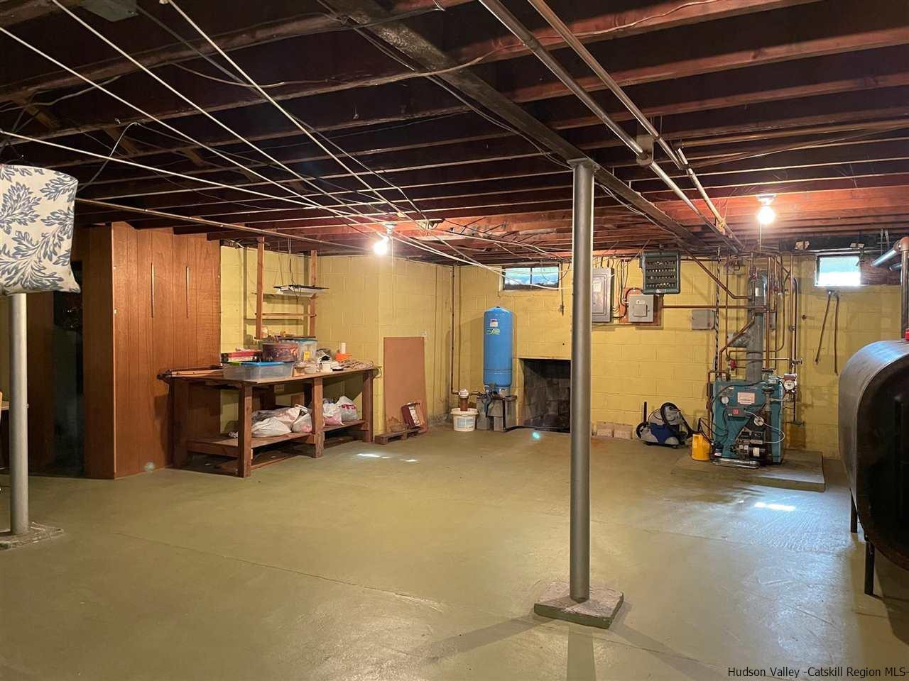 307 Blue Mountain Road Saugerties, NY 12477 - Photo 16 of 20 a view of a garage with chairs