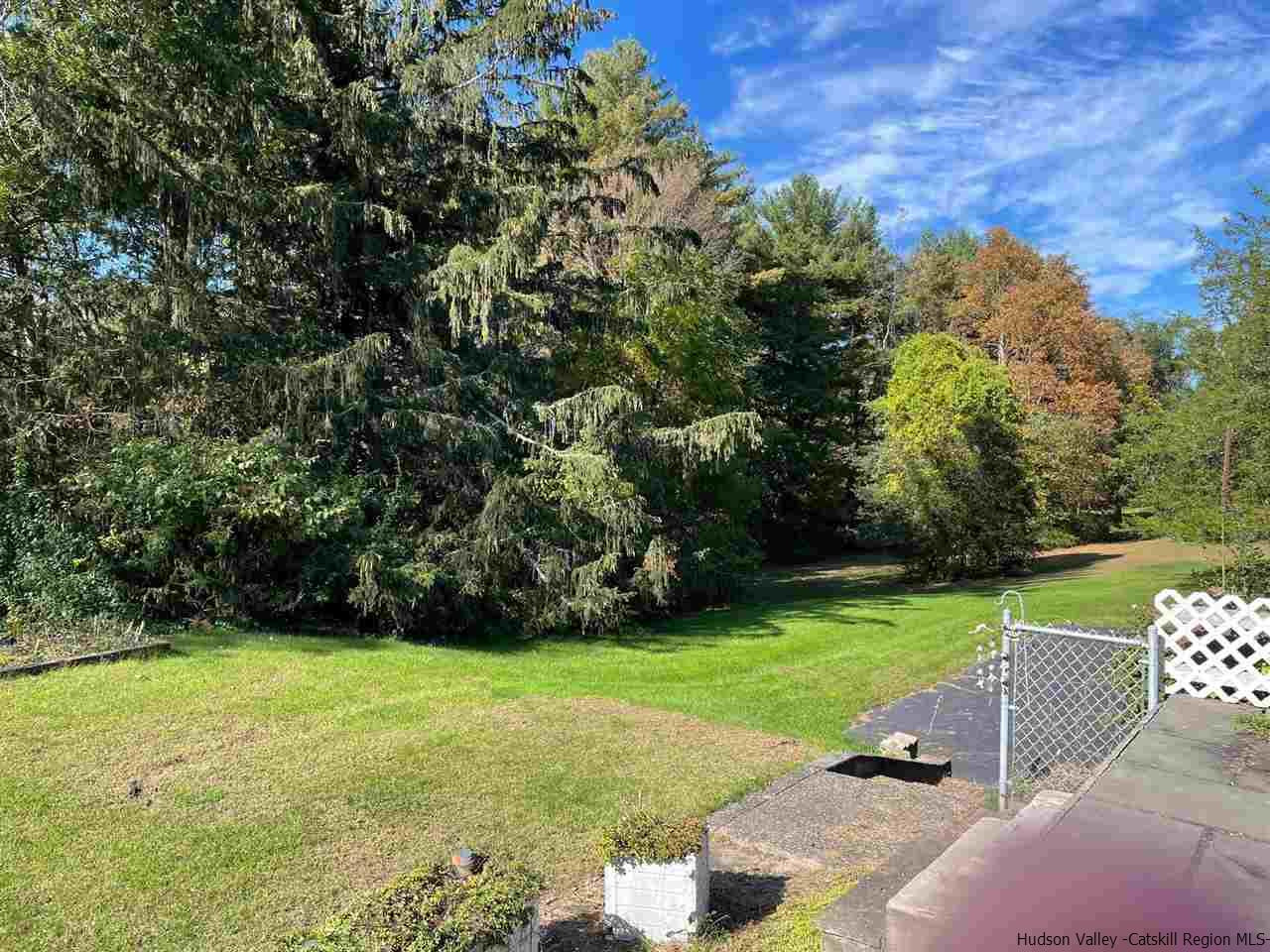 307 Blue Mountain Road Saugerties, NY 12477 - Photo 4 of 20 a view of a garden with a bench