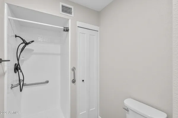 a view of an empty walk in closet