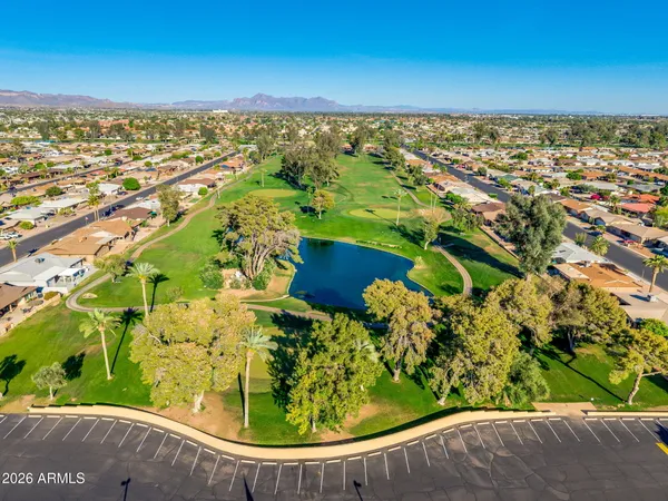 an aerial view of a house with a garden