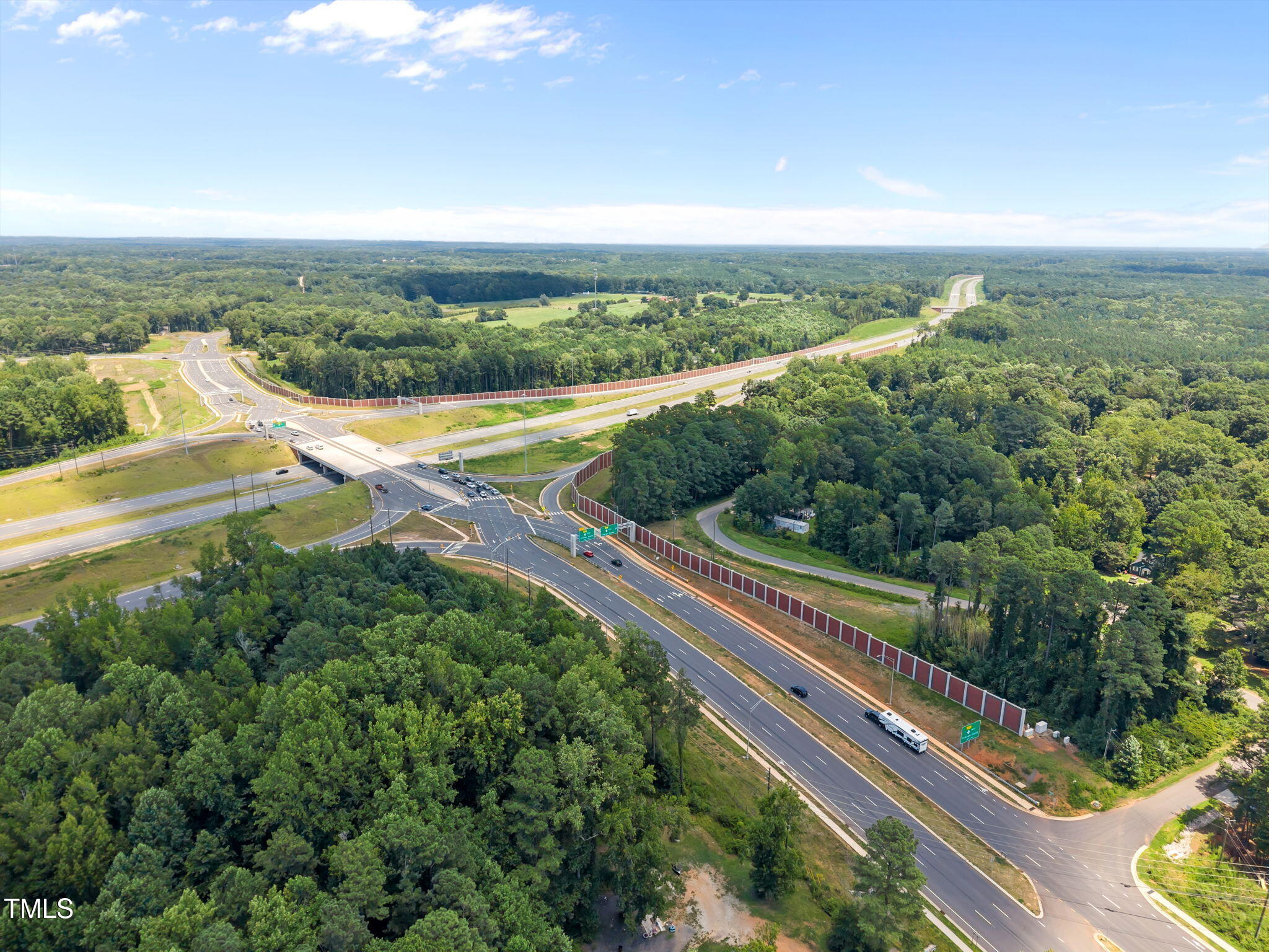 9640 Holly Springs Road Apex, NC 27539 - Photo 17 of 23 a view of a city from a terrace