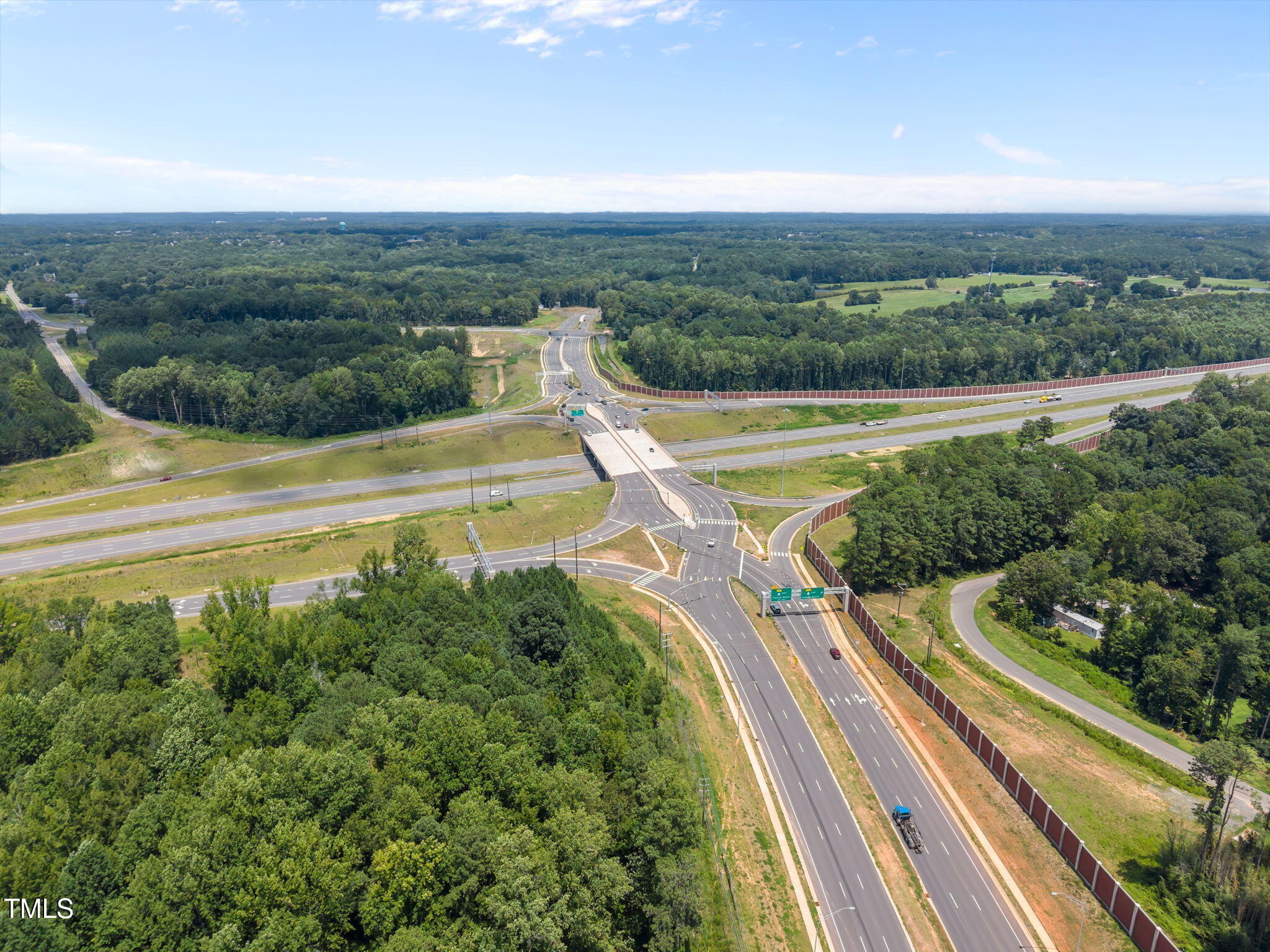 9640 Holly Springs Road Apex, NC 27539 - Photo 18 of 23 a view of a city from a balcony