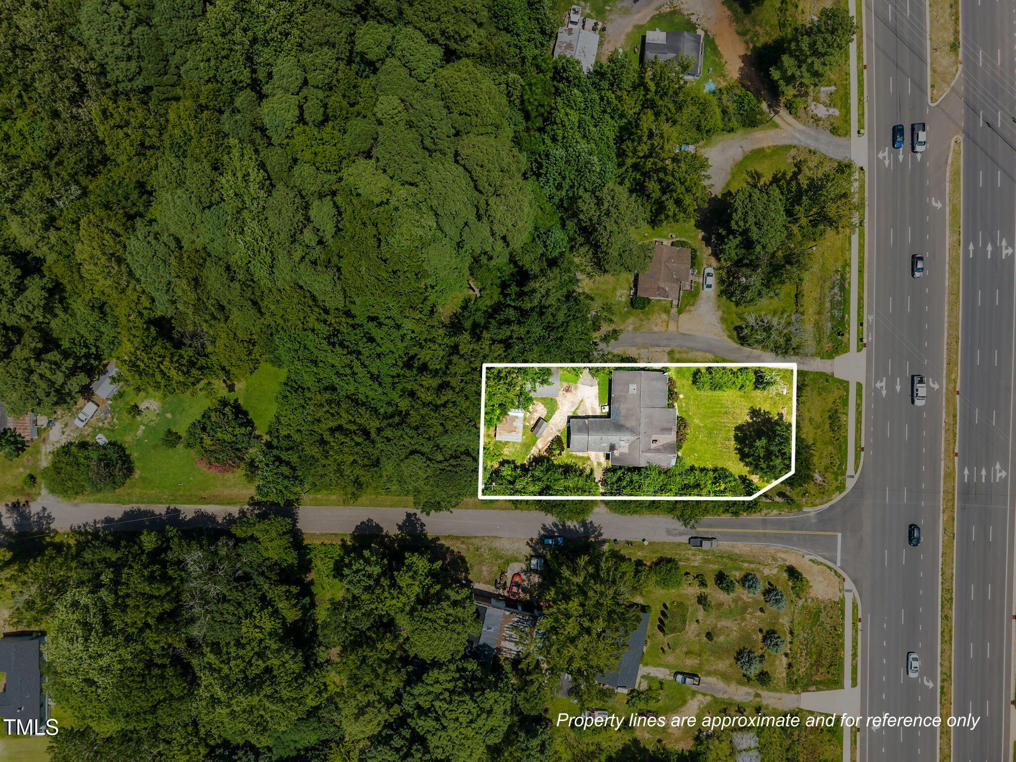 9640 Holly Springs Road Apex, NC 27539 - Photo 5 of 23 an aerial view of a house with a yard