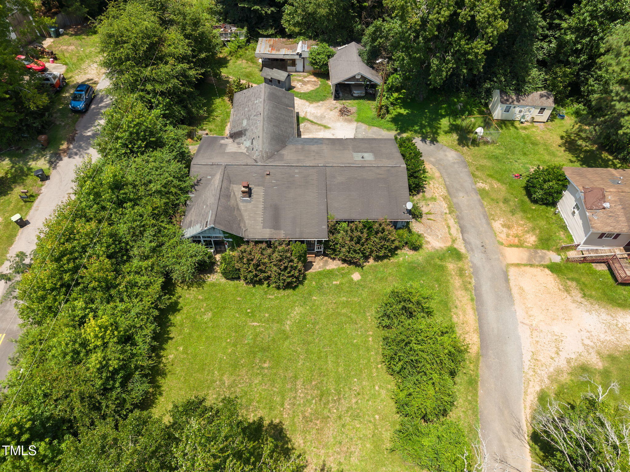 9640 Holly Springs Road Apex, NC 27539 - Photo 6 of 23 an aerial view of a house with a yard swimming pool and outdoor seating