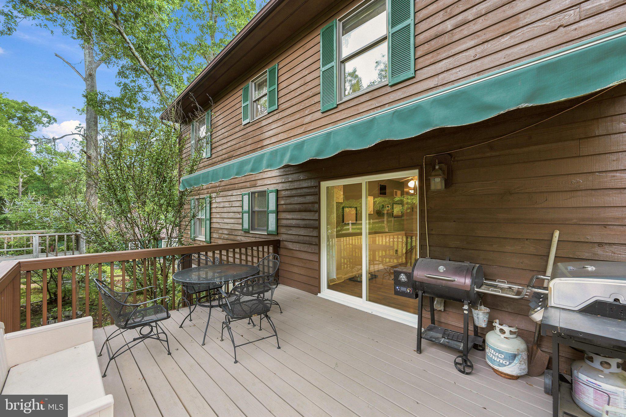 150 Holiday Road Cross Junction, VA 22625 - Photo 5 of 97 Rear deck w/ retractable awning