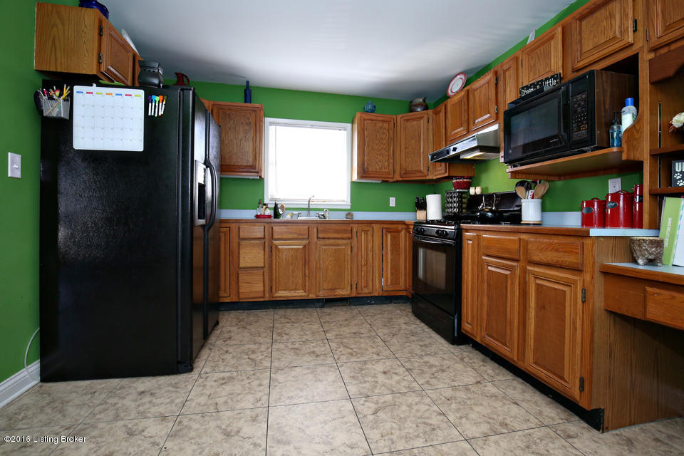 9505 Maple Road Louisville, KY 40229 - Photo 10 of 30 Large tile ceramic flooring