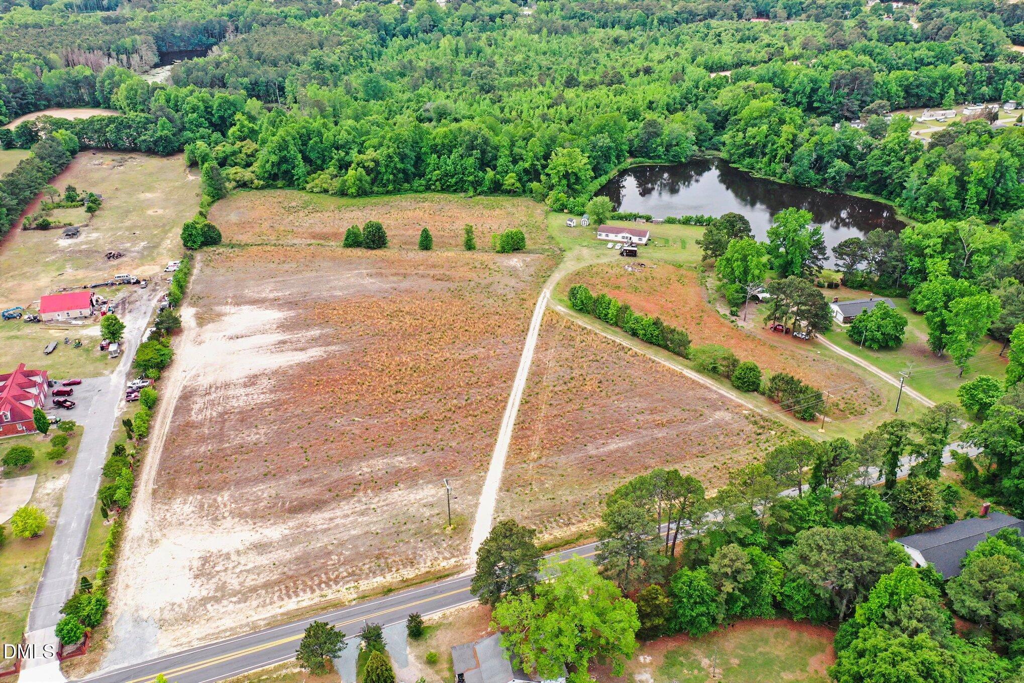 6709 Wimberly Road Willow Spring, NC 27592 - Photo 3 of 23 an aerial view of a house with yard